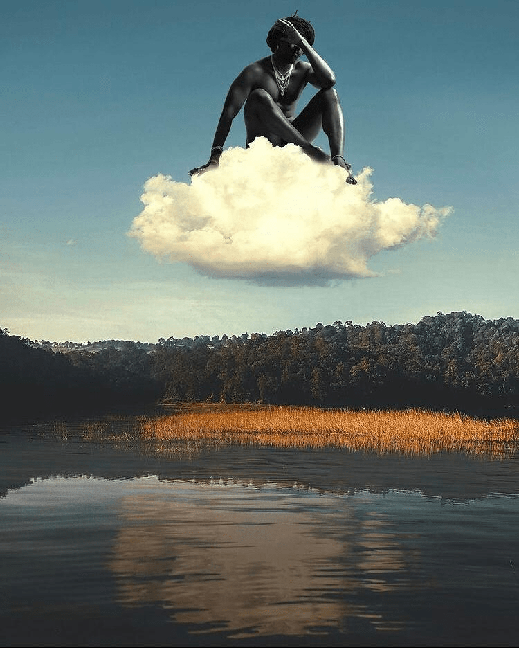 man floating on a cloud