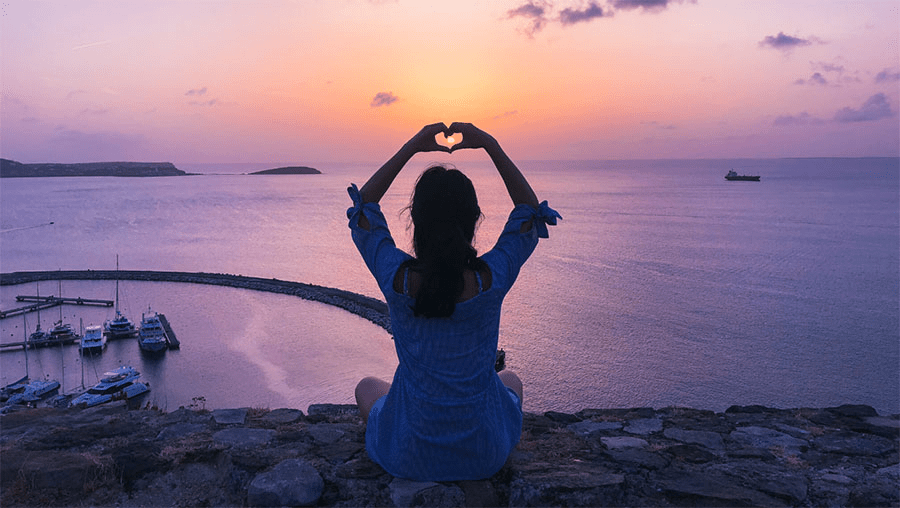 woman sitting at the beach