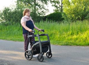 woman with Parkinson's disease walking down the road